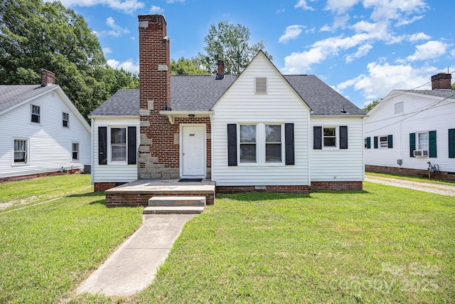 900 N Salisbury Ave, Spencer, NC 28159 - bungalow-style home featuring roof with shingles, a front yard, a chimney, and crawl space