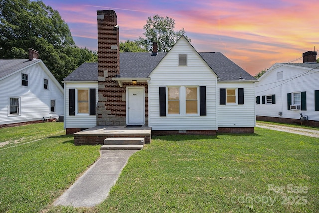 900 N Salisbury Ave, Spencer, NC 28159 - bungalow-style house featuring a shingled roof, a front yard, and a chimney