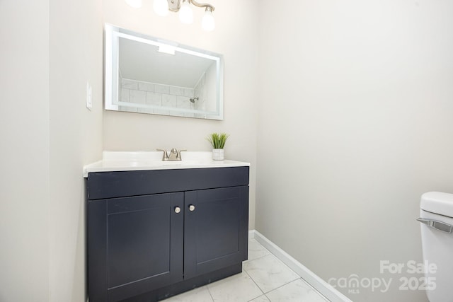 900 N Salisbury Ave, Spencer, NC 28159 - bathroom featuring marble look tiles and vanity