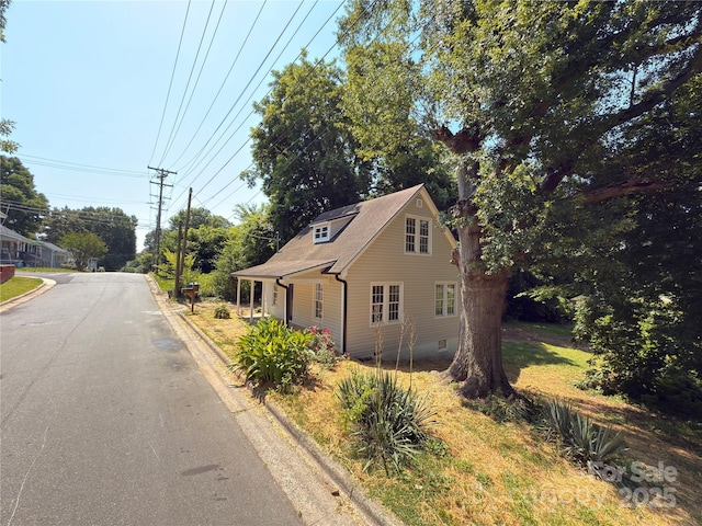 179 Duval St NW, Concord, NC 28025 - view of asphalt road with curbs