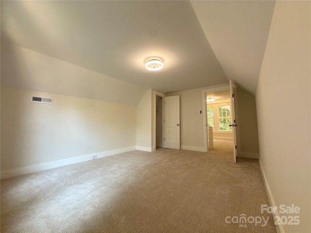 179 Duval St NW, Concord, NC 28025 - bonus room featuring light carpet and vaulted ceiling