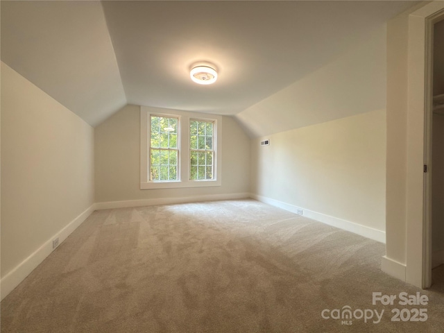 179 Duval St NW, Concord, NC 28025 - additional living space featuring carpet and lofted ceiling