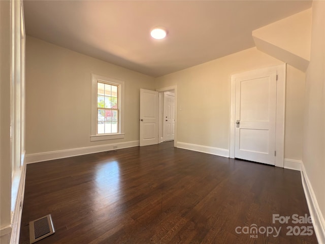 179 Duval St NW, Concord, NC 28025 - unfurnished room with dark wood finished floors