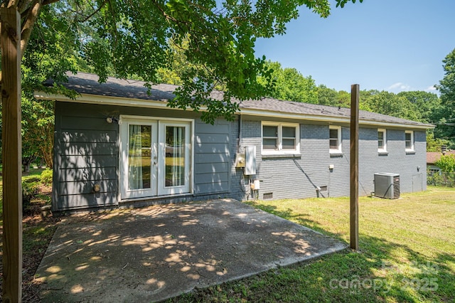 108 Graham St, Stanley, NC 28164 - back of house with a lawn, a patio, and brick siding