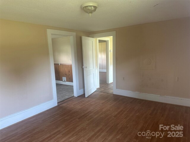 162 Bartley St, Spindale, NC 28160 - unfurnished room featuring wood finished floors and baseboards