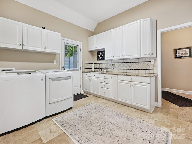 1842 Caroline Way, Fort Mill, SC 29715 - laundry room featuring washing machine and dryer, cabinet space, and light stone finish flooring