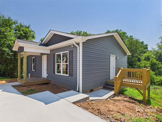39 Pearl St, Granite Falls, NC 28630 - view of property exterior with a porch and crawl space