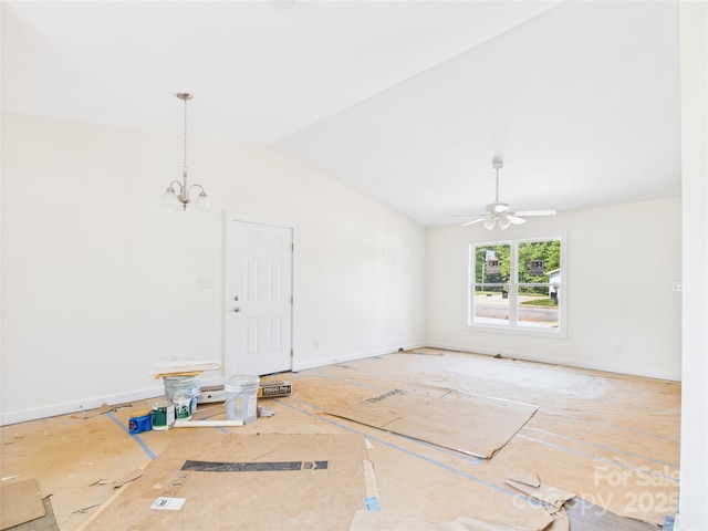 39 Pearl St, Granite Falls, NC 28630 - unfurnished living room featuring lofted ceiling, ceiling fan, and a chandelier