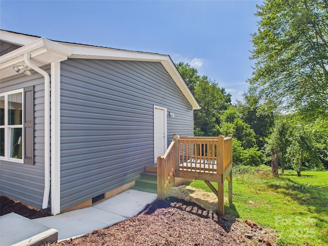 39 Pearl St, Granite Falls, NC 28630 - view of property exterior featuring a lawn and a deck