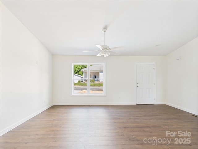 39 Pearl St, Granite Falls, NC 28630 - empty room with wood finished floors and ceiling fan