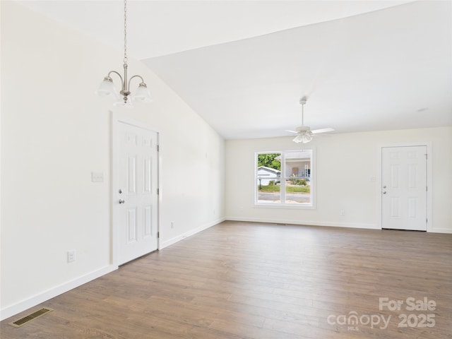 39 Pearl St, Granite Falls, NC 28630 - unfurnished living room with wood finished floors, a chandelier, and a ceiling fan