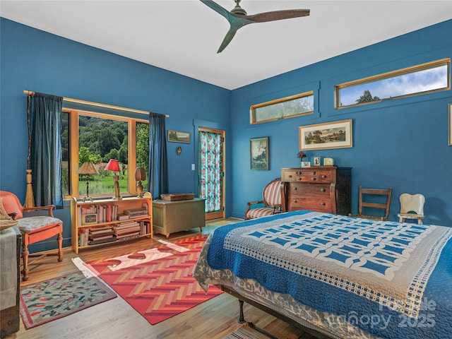 32 Sugar Cove Rd, Weaverville, NC 28787 - bedroom with wood finished floors and a ceiling fan
