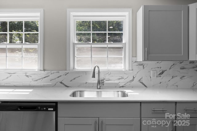 509 8th Avenue Ext, Cramerton, NC 28032 - kitchen featuring dishwasher, gray cabinets, light countertops, and tasteful backsplash