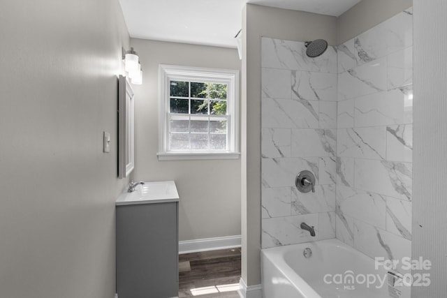509 8th Avenue Ext, Cramerton, NC 28032 - full bathroom with vanity, shower / tub combination, and wood finished floors