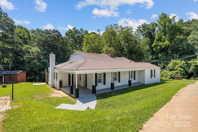 509 8th Avenue Ext, Cramerton, NC 28032 - view of front of property featuring a chimney, a front lawn, a porch, and stucco siding