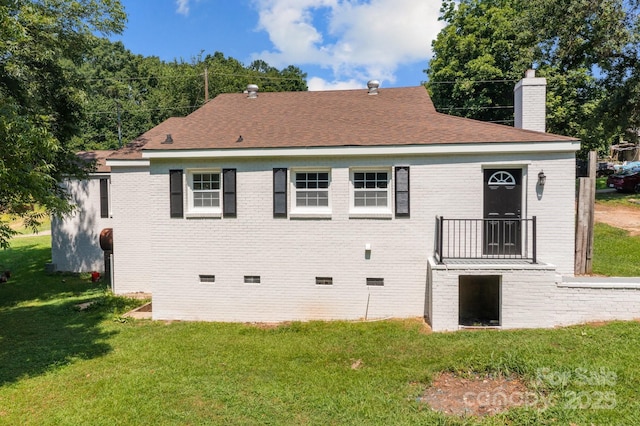 509 8th Avenue Ext, Cramerton, NC 28032 - back of house featuring crawl space, a chimney, brick siding, and a yard