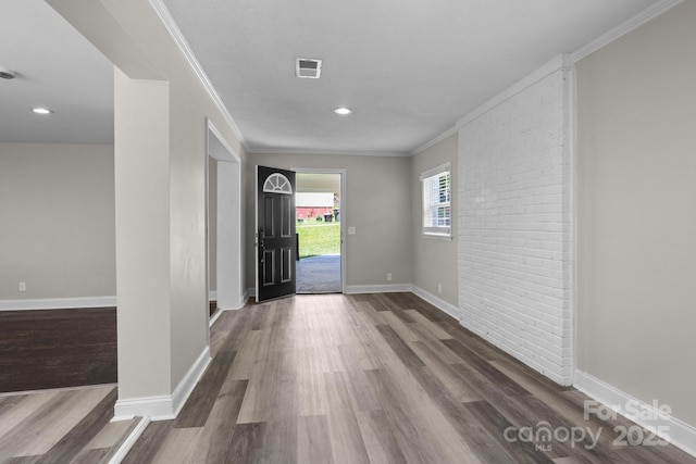 509 8th Avenue Ext, Cramerton, NC 28032 - foyer with dark wood finished floors, ornamental molding, and recessed lighting