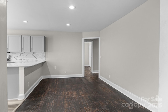 509 8th Avenue Ext, Cramerton, NC 28032 - unfurnished dining area featuring dark wood-type flooring and recessed lighting