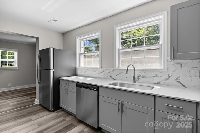 509 8th Avenue Ext, Cramerton, NC 28032 - kitchen with appliances with stainless steel finishes, gray cabinets, and light countertops