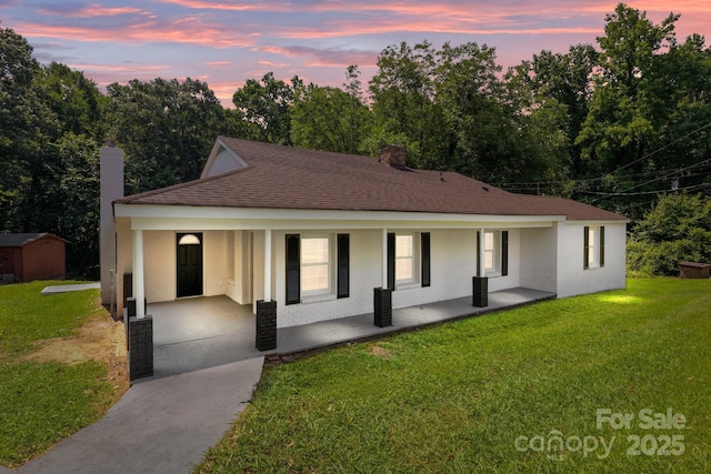 509 8th Avenue Ext, Cramerton, NC 28032 - single story home featuring covered porch, a chimney, concrete driveway, a carport, and a front yard