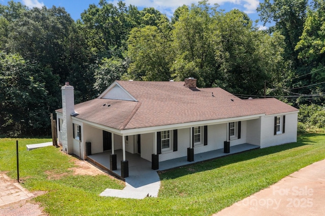 509 8th Avenue Ext, Cramerton, NC 28032 - view of front of home with a chimney, a front lawn, stucco siding, and a porch