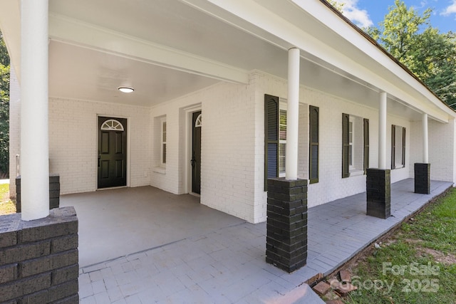 509 8th Avenue Ext, Cramerton, NC 28032 - entrance to property featuring brick siding and a patio