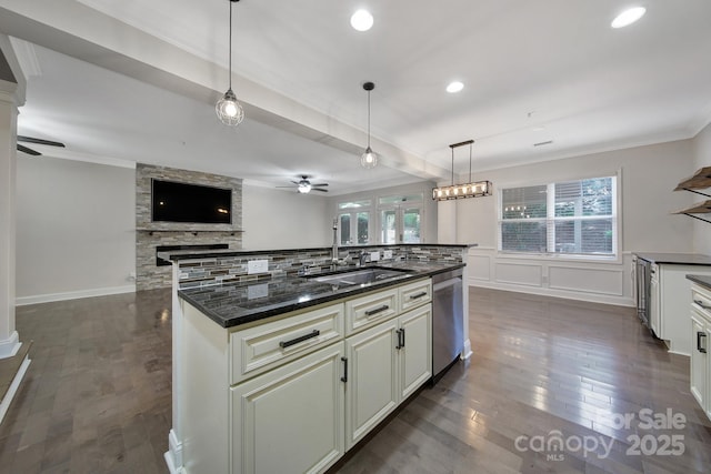 329 Wave Crest Dr, Tega Cay, SC 29708 - kitchen featuring a ceiling fan, crown molding, hanging light fixtures, dark wood-type flooring, and stainless steel dishwasher