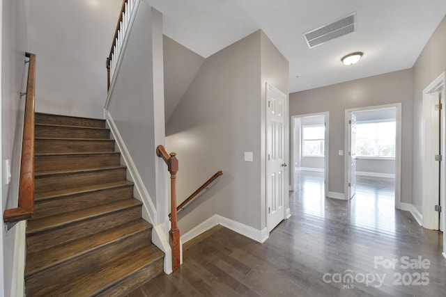 329 Wave Crest Dr, Tega Cay, SC 29708 - stairway featuring wood finished floors and baseboards