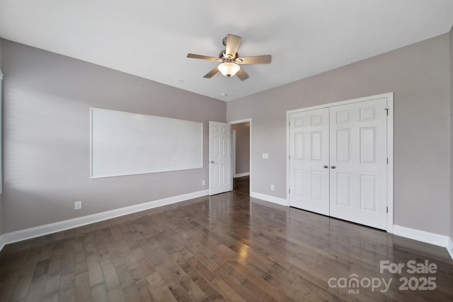 329 Wave Crest Dr, Tega Cay, SC 29708 - unfurnished bedroom featuring wood finished floors, a closet, and ceiling fan