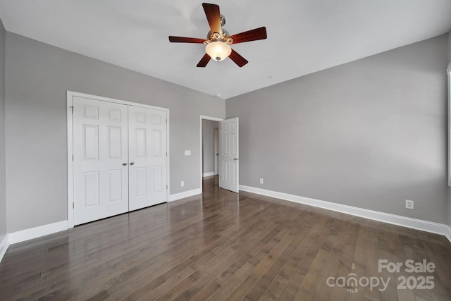 329 Wave Crest Dr, Tega Cay, SC 29708 - unfurnished bedroom with wood finished floors, a closet, and a ceiling fan