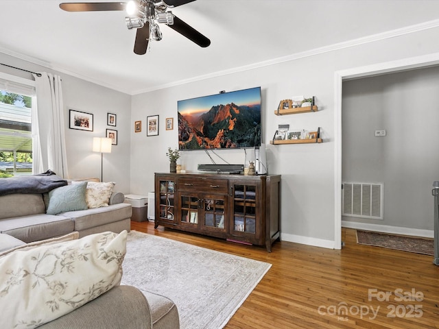 5007 Rehobeth Rd, Waxhaw, NC 28173 - living area with ceiling fan, ornamental molding, and wood finished floors