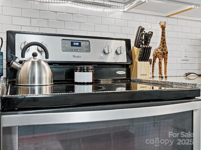 5007 Rehobeth Rd, Waxhaw, NC 28173 - kitchen view of stainless steel range with electric cooktop and decorative backsplash