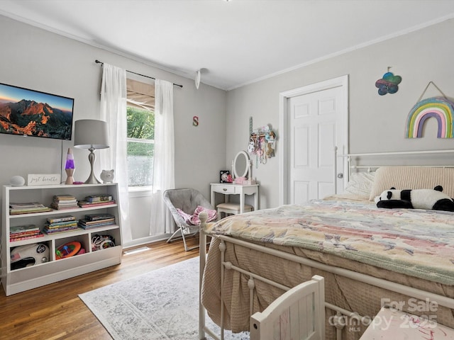 5007 Rehobeth Rd, Waxhaw, NC 28173 - bedroom featuring wood finished floors and crown molding