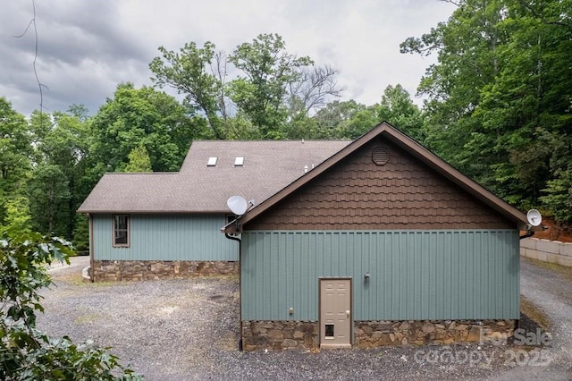 486 Center Dr Unit 7B, Bryson City, NC 28713 - view of home's exterior with roof with shingles