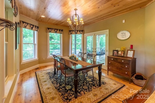 486 Center Dr Unit 7B, Bryson City, NC 28713 - dining room with wood ceiling, a chandelier, french doors, healthy amount of natural light, and light wood-type flooring