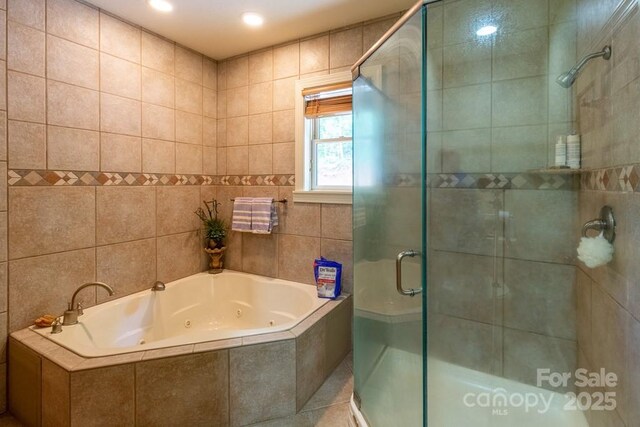 486 Center Dr Unit 7B, Bryson City, NC 28713 - bathroom with a jetted tub and a shower stall