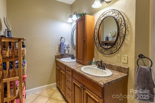 486 Center Dr Unit 7B, Bryson City, NC 28713 - bathroom featuring double vanity, a textured wall, and tile patterned flooring