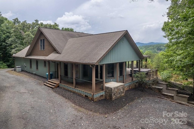 486 Center Dr Unit 7B, Bryson City, NC 28713 - view of front of house with covered porch and a shingled roof