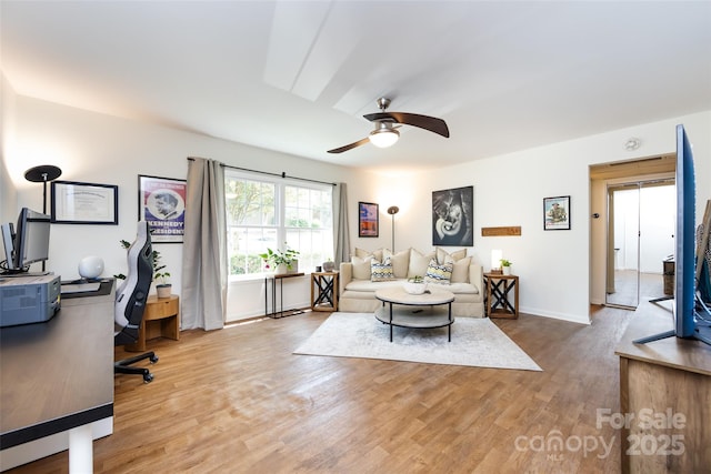 2620 Park Rd Unit F, Charlotte, NC 28209 - living room featuring ceiling fan, an office area, and wood finished floors
