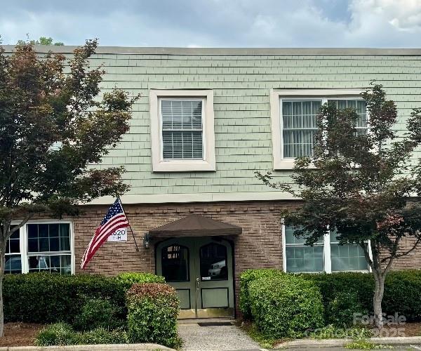 2620 Park Rd Unit F, Charlotte, NC 28209 - view of exterior entry featuring brick siding