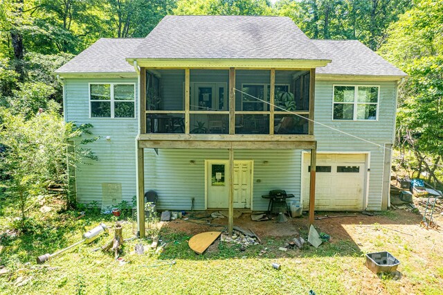 164 Horseplay Ln, Lake Toxaway, NC 28747 - view of front of property featuring a garage, a sunroom, and roof with shingles
