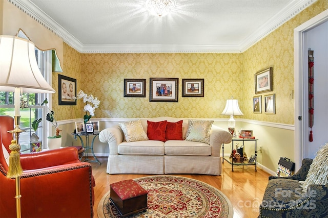 701 4th Ave NE, Conover, NC 28613 - living room with crown molding, wood finished floors, and wallpapered walls