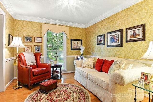 701 4th Ave NE, Conover, NC 28613 - living room featuring wood finished floors, wallpapered walls, ornamental molding, and wainscoting