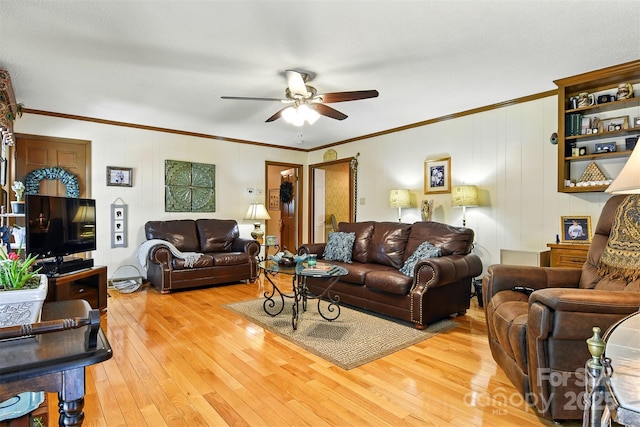 701 4th Ave NE, Conover, NC 28613 - living room with a ceiling fan, crown molding, and light wood-type flooring