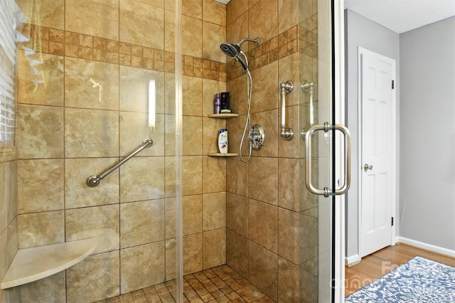 701 4th Ave NE, Conover, NC 28613 - bathroom featuring wood finished floors and a shower stall