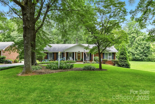 701 4th Ave NE, Conover, NC 28613 - ranch-style home with a front lawn, a porch, and brick siding