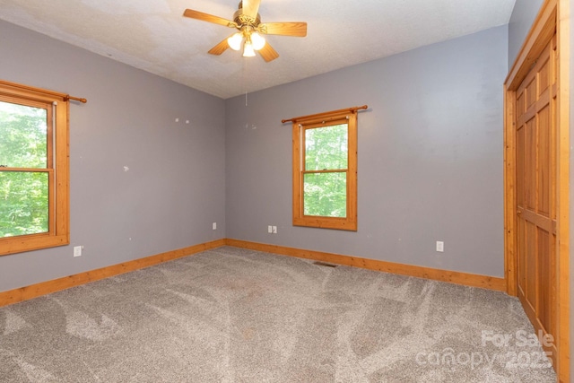 25 Trillium Trce, Maggie Valley, NC 28751 - unfurnished bedroom featuring carpet and a ceiling fan