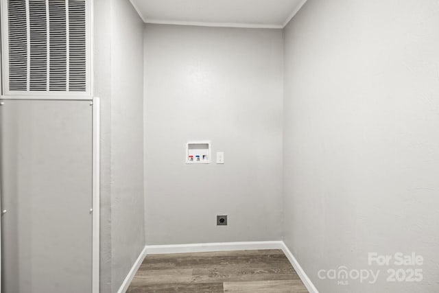 1133 Lynn Ln, Catawba, NC 28609 - laundry area featuring a heating unit, hookup for a washing machine, and wood finished floors
