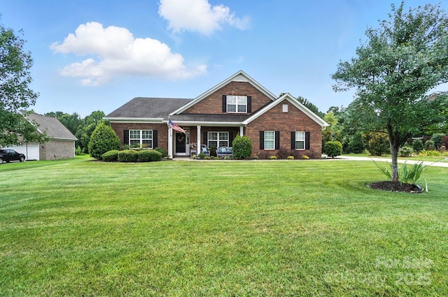 1006 Spring Rose Ln, Matthews, NC 28104 - traditional-style house featuring brick siding, a front yard, and a porch