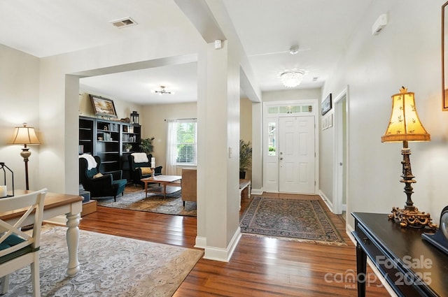 1006 Spring Rose Ln, Matthews, NC 28104 - foyer entrance featuring wood finished floors and baseboards